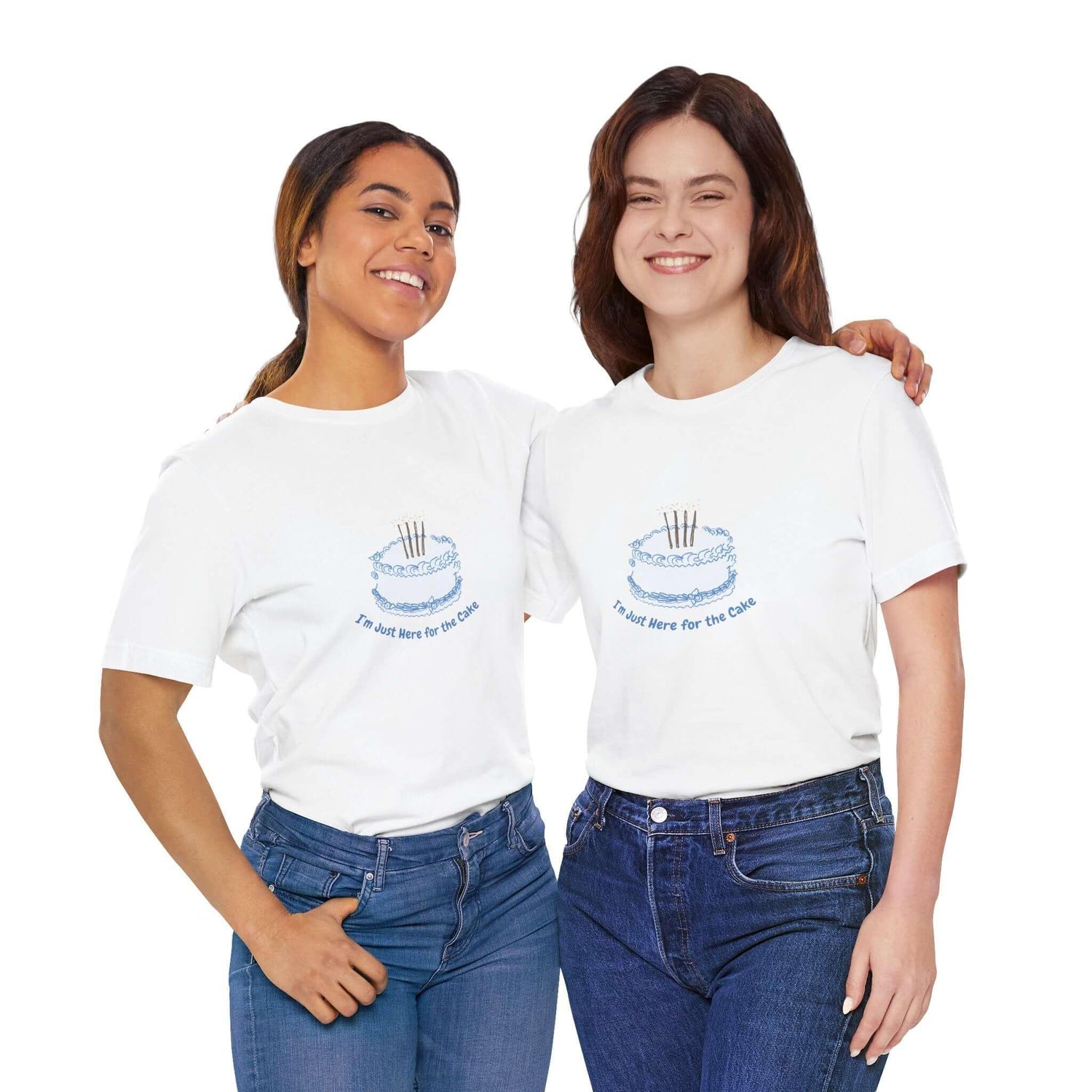 Two women wearing 'I'm Just Here for the Cake' funny T-shirts from PurpleSquish. Perfect for humor and style lovers.