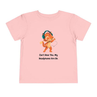 Pink toddler t-shirt with cartoon tiger wearing headphones and text 'Can't Hear You, My Headphones Are On'. 100% cotton.