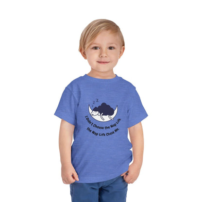 Toddler wearing a blue funny t-shirt with nap-themed design, showcasing custom short sleeve tee perfect for kids, made of soft cotton.