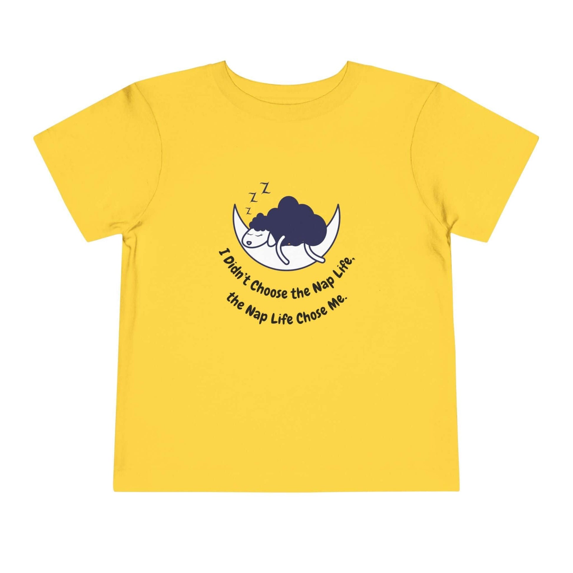 Yellow toddler t-shirt with a funny nap-themed design, featuring a cartoon sheep and the text 'I don't choose the nap life, the nap life chose me'. Perfect for kids.