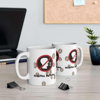 Two ceramic mugs on a desk featuring 'No Coffee, No Talkie' design with coffee beans, suitable for microwave and dishwasher use.