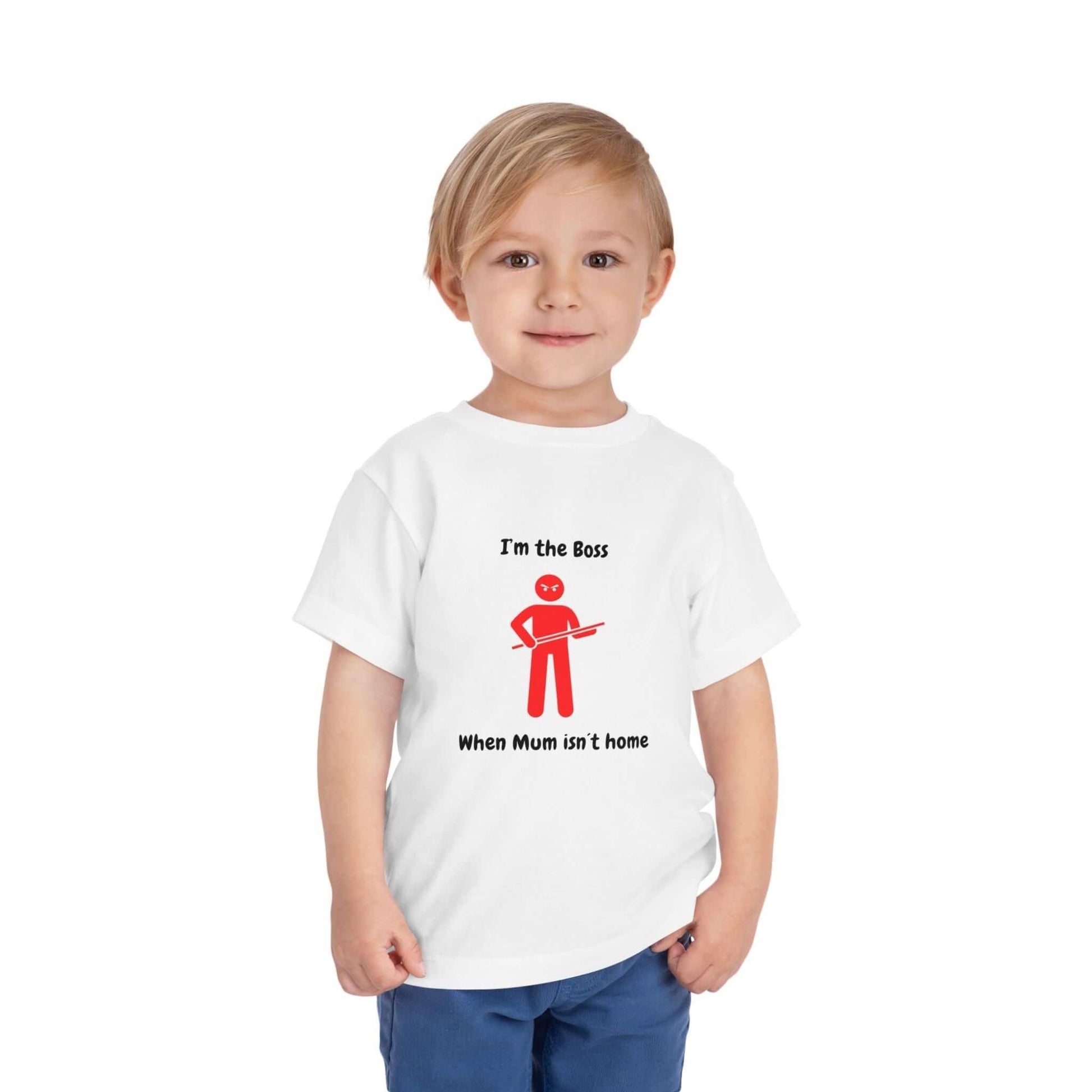 Toddler wearing 'I'm the Boss' funny t-shirt with red graphic, Bella Canvas short sleeve, white cotton, perfect for kids' wardrobe.