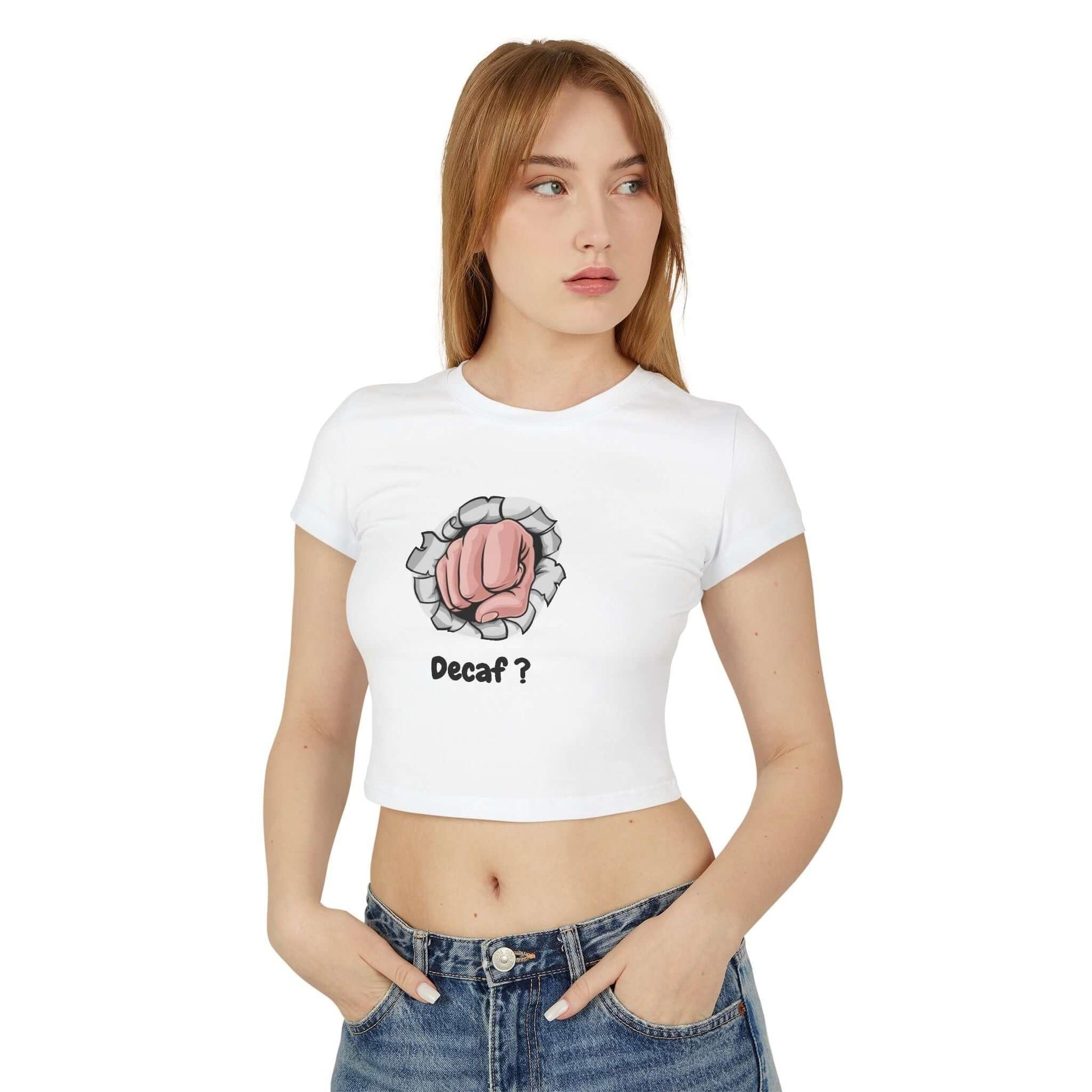 Woman wearing a funny decaf-themed baby tee, slim fit, made from 100% organic cotton, ideal for everyday wear.